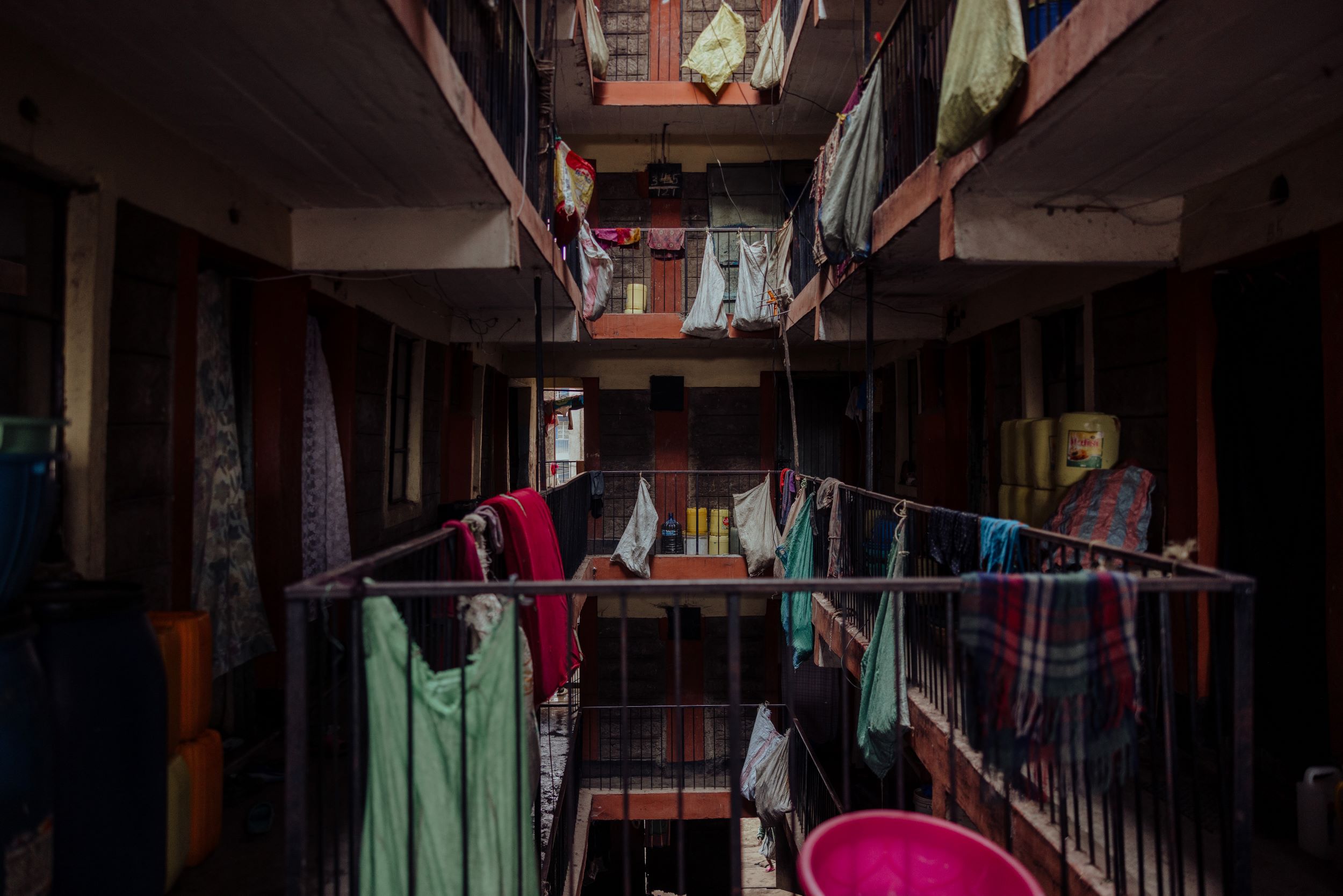 Staircase in building with washing hanging from rails