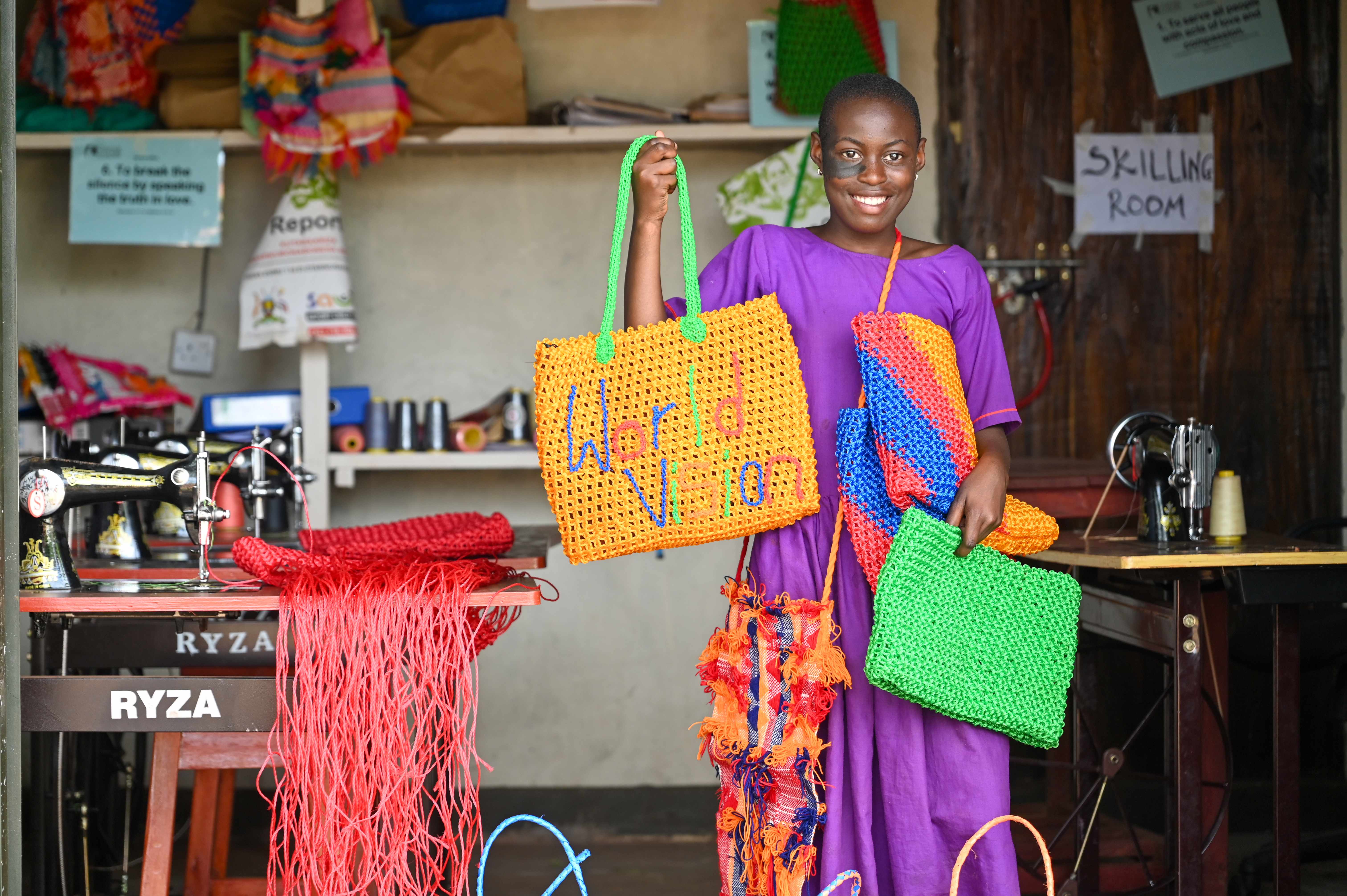 Danielle in Uganda showing her knitting