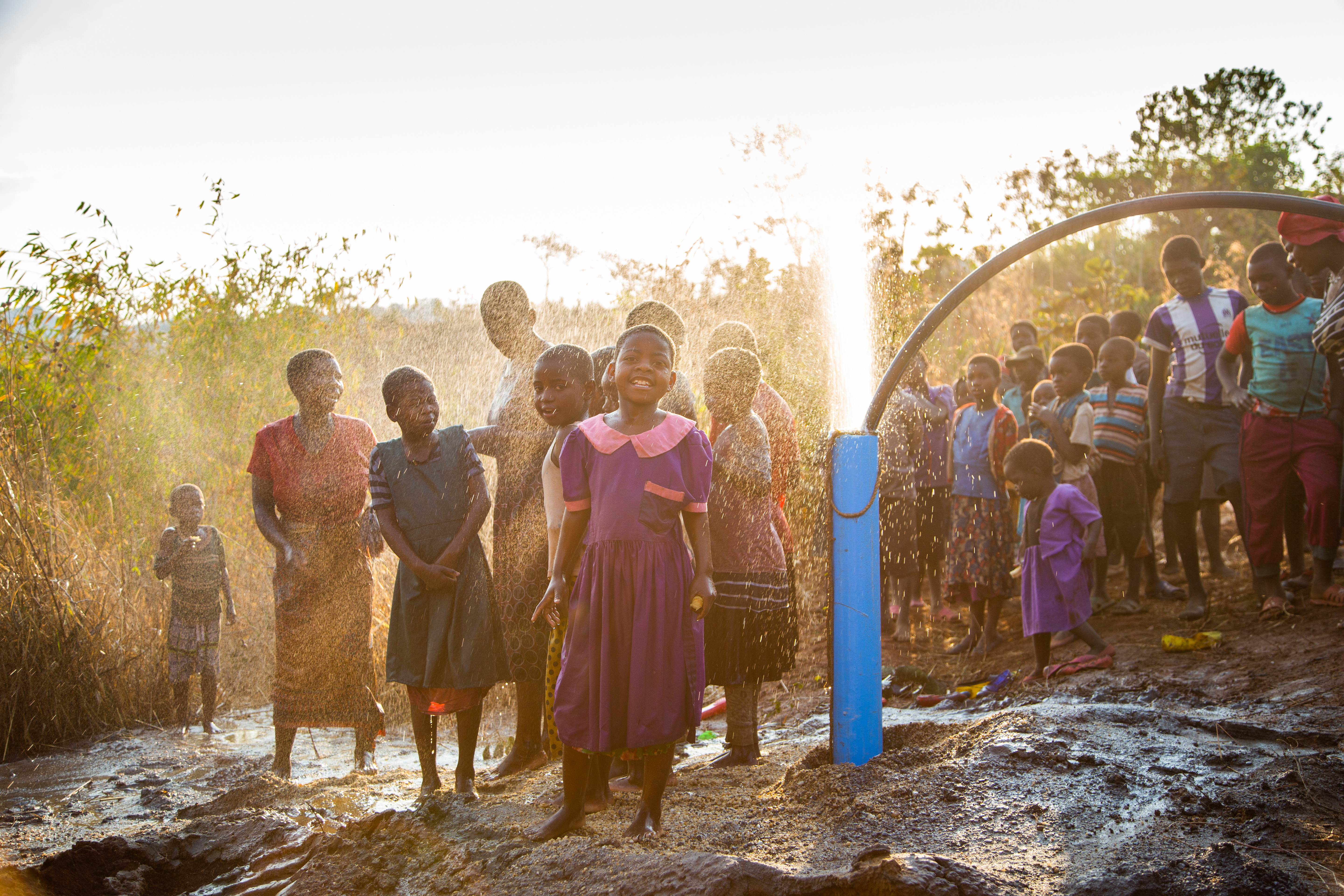 Community in Malawi celebrates as a borehole produces clean water