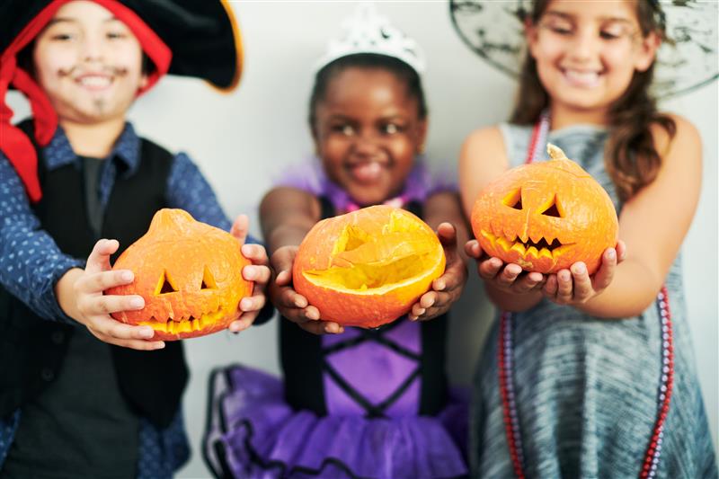 A group of children enjoying a Halloween-time event