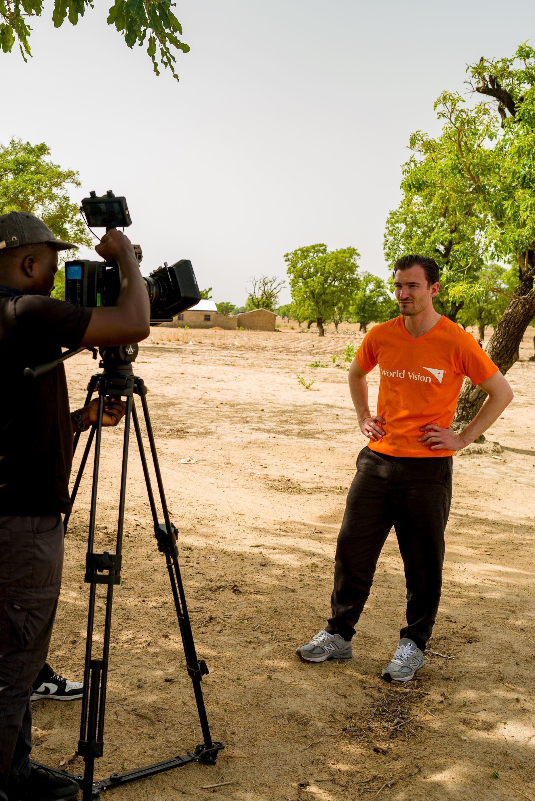 Brett Staniland talks with cameraman
