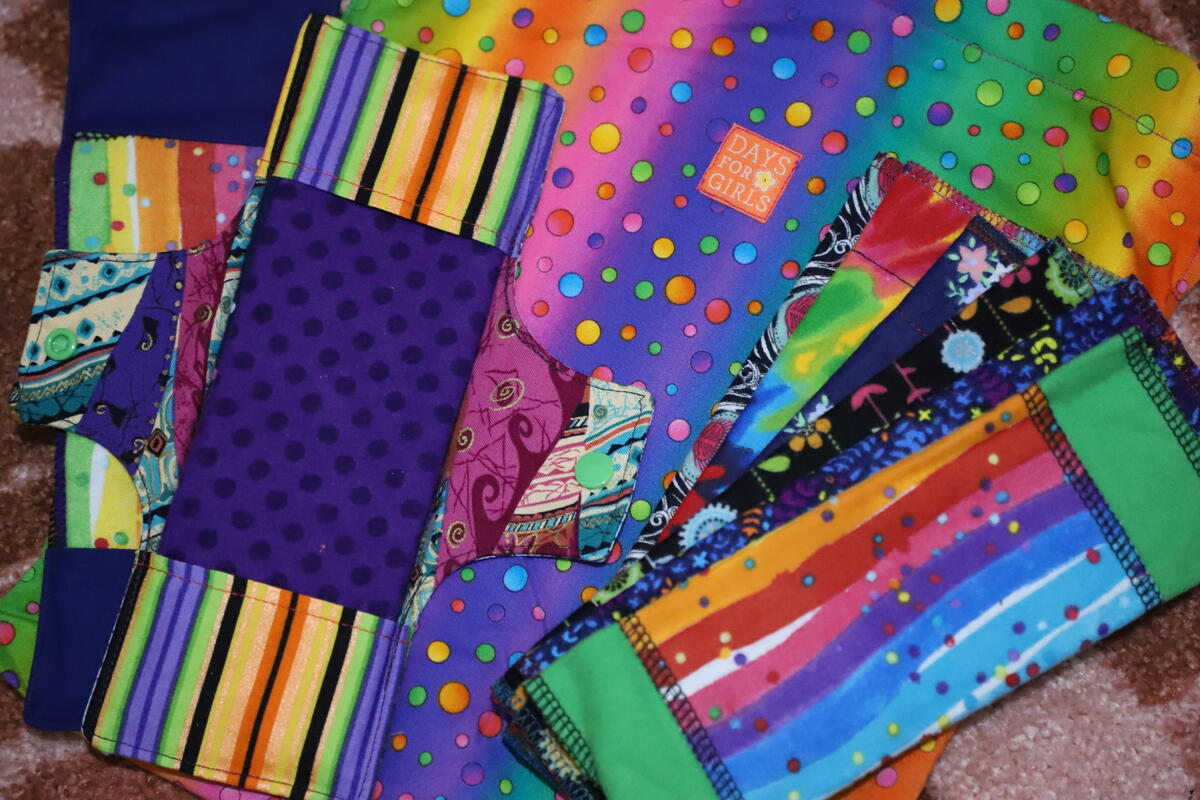 A selection of colourful reusable sanitary pads made in Afghanistan in a World Vision project.