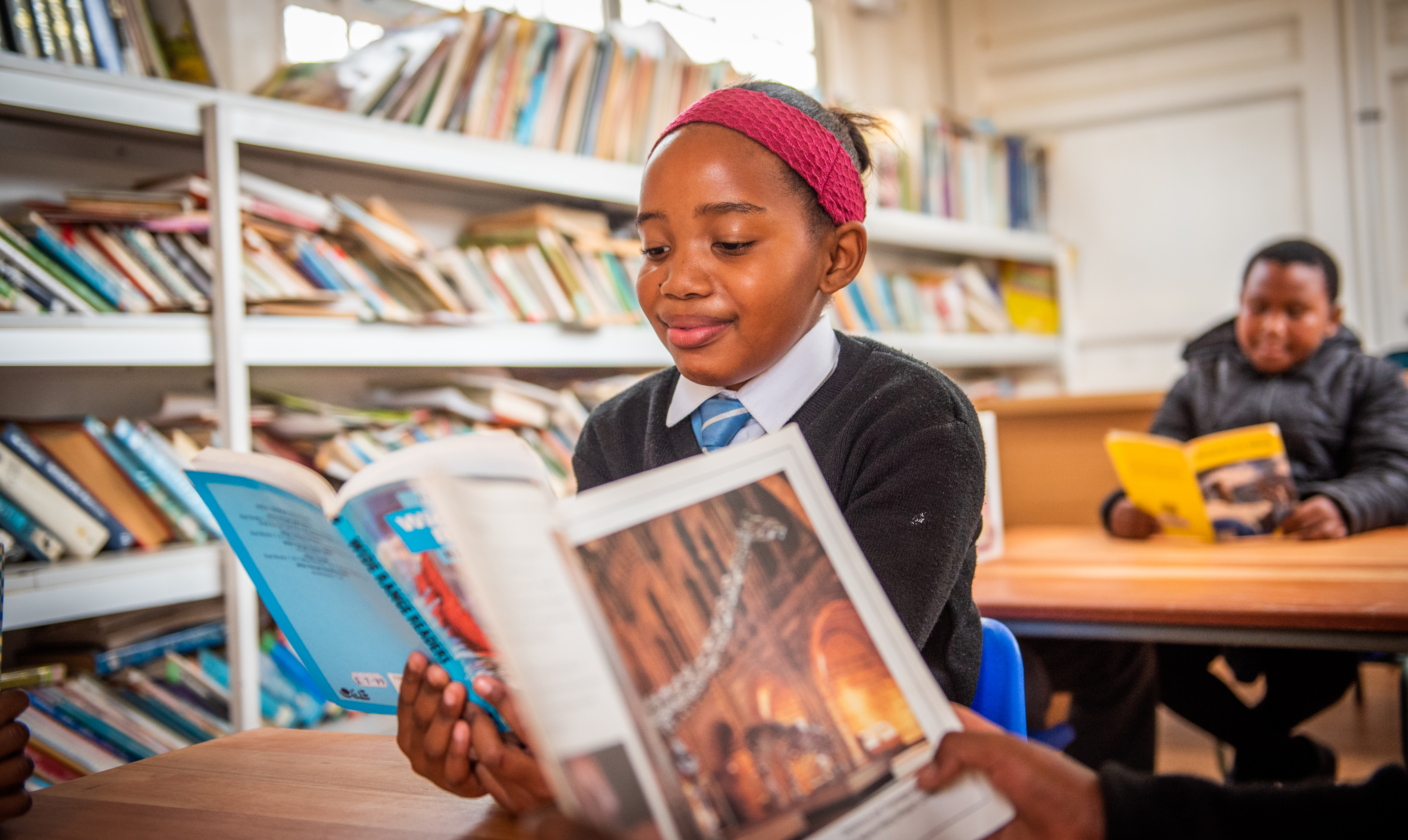 Child reading a book