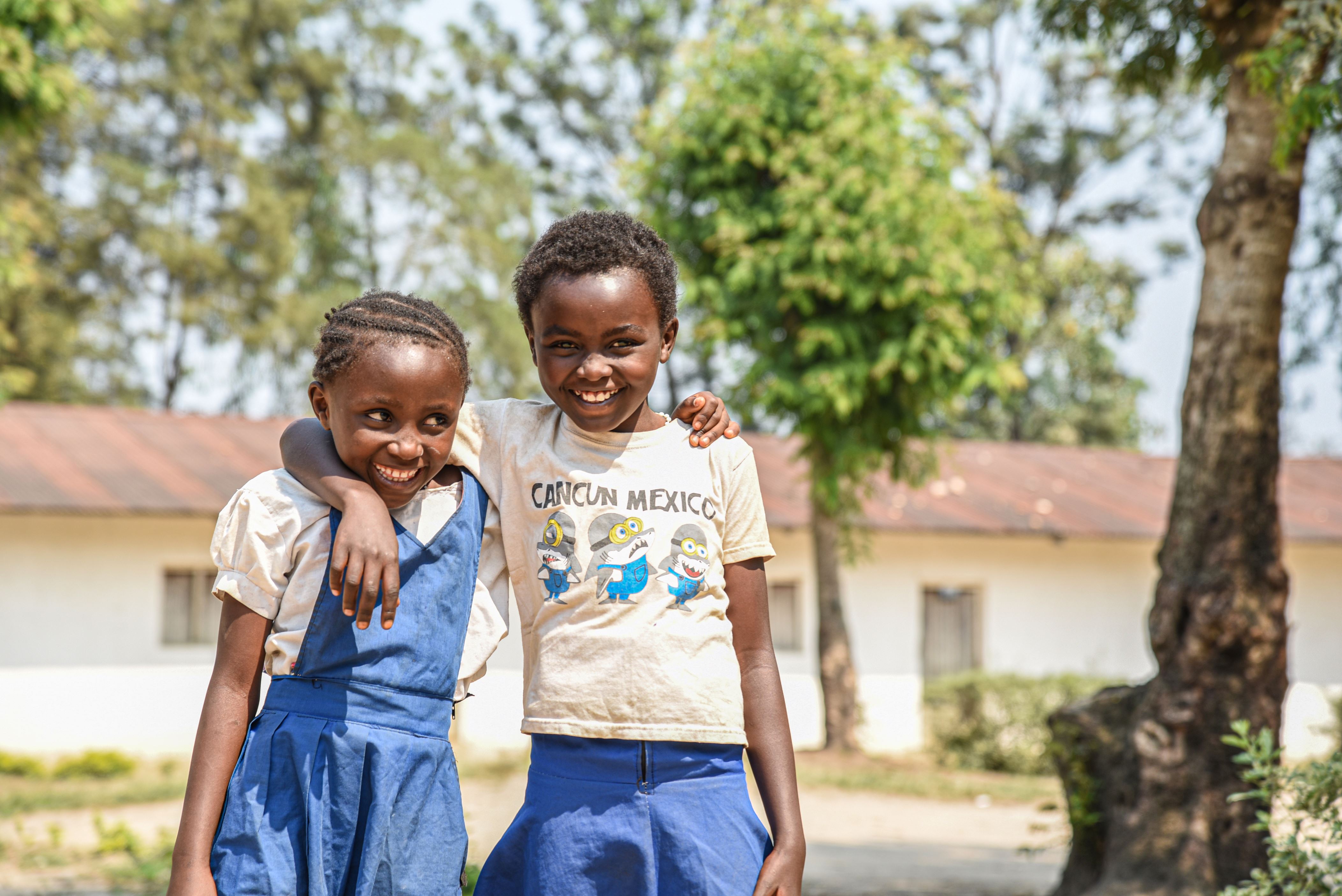 Irene and little sister Eugene at their primary school.