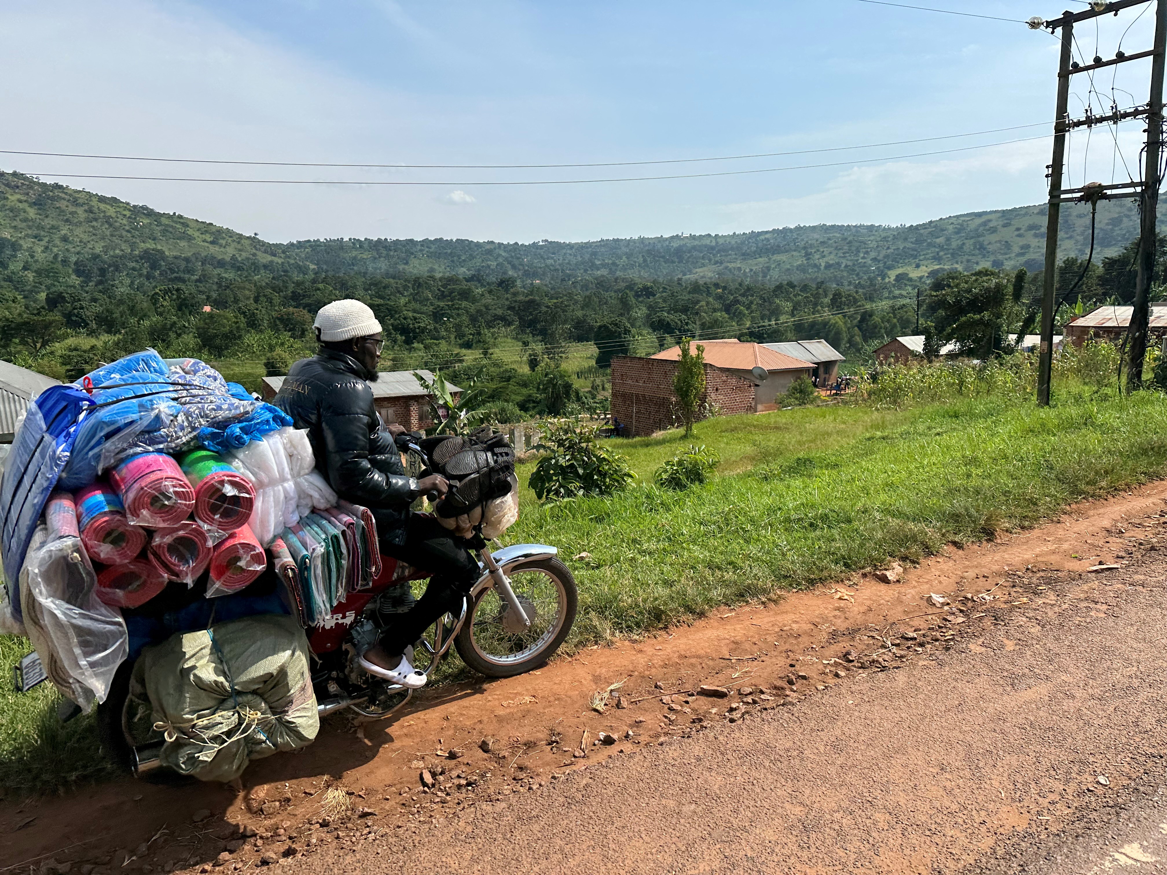 Motorbike laden with goods, Uganda