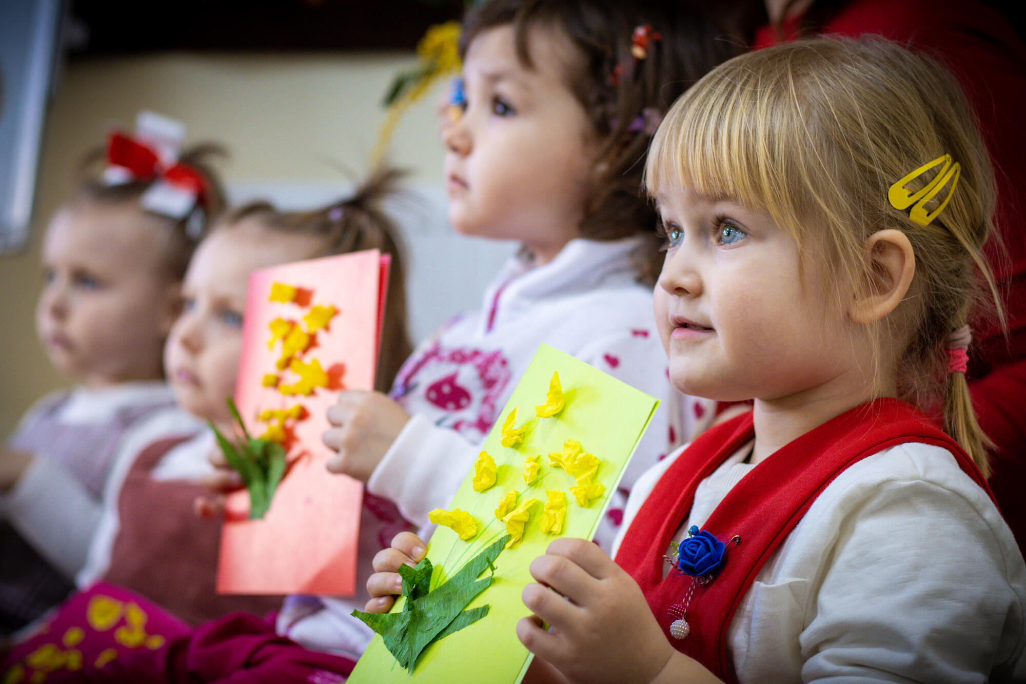 Children show off their artwork