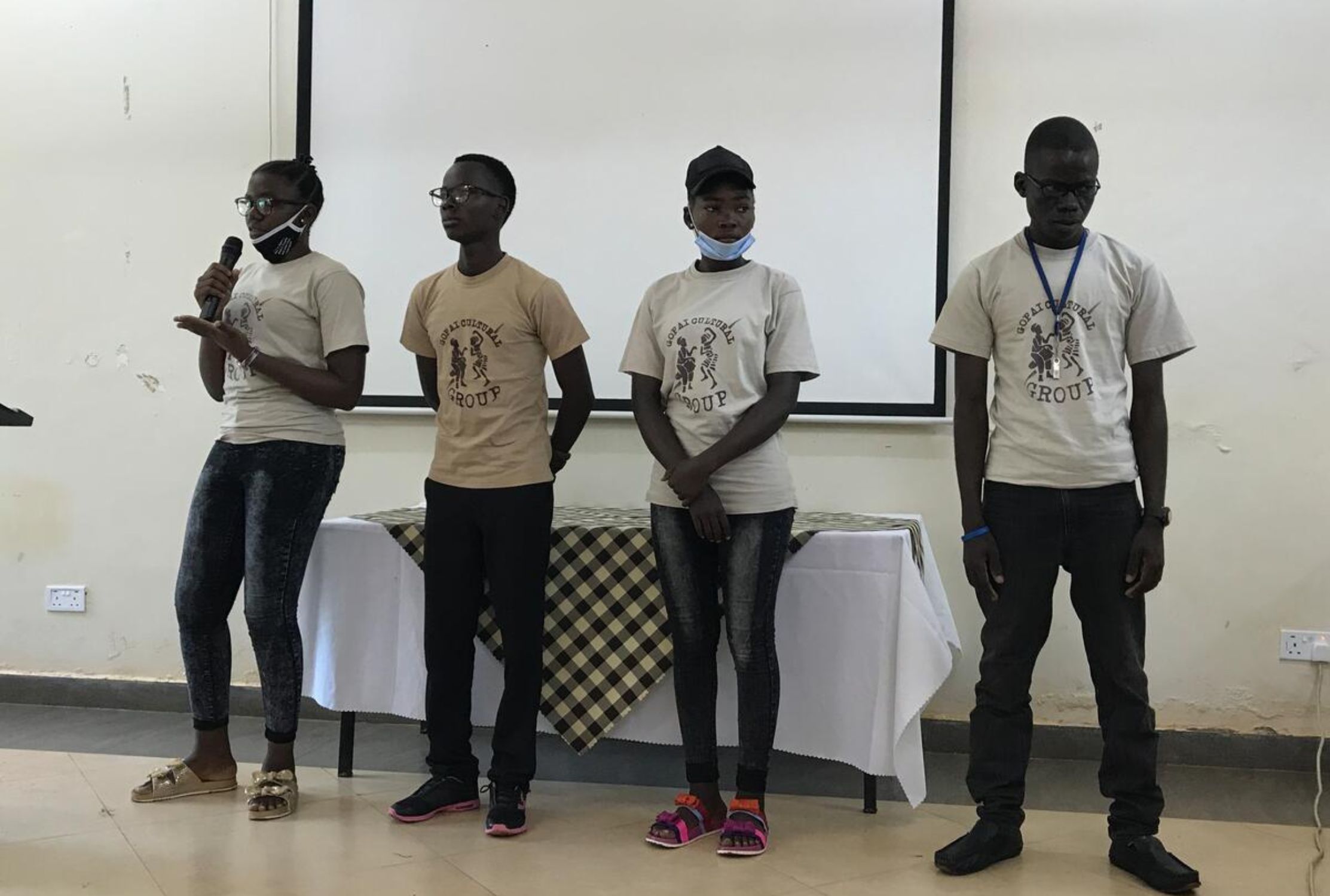 Four boys speaking out about child soldiers' welfare and wellbeing