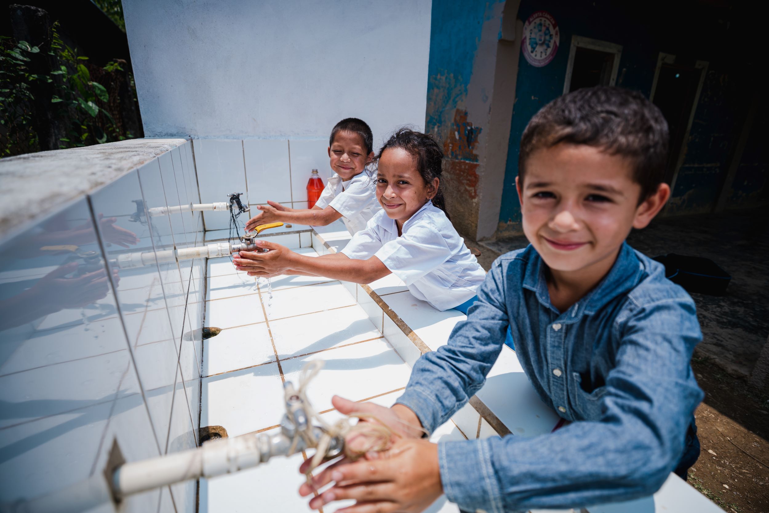 Children washing their hands at a school in Honduras