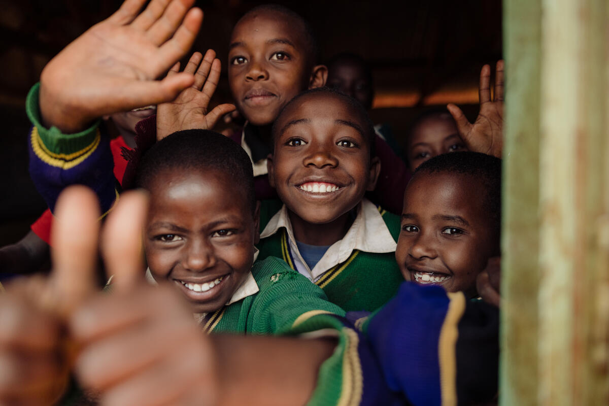 Smiling children in Tanzania have fresh running water at their school